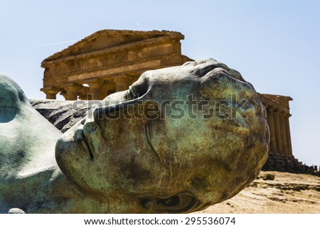 Concordia Temple behind the bronze sculpture of Icarus, person of greek mythology - Valley of the temples