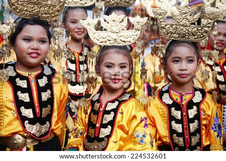 Kota Belud, Sabah, Malaysia, Okt 18, 2014 : Young girls from the Bajau ethnic wearing their traditional costume and headdress called \