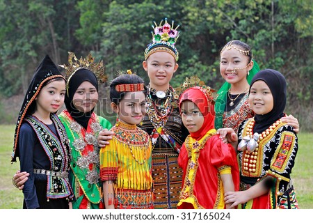 Kota Kinabalu, Sabah. September 15, 2015: School children attending school in their multiracial traditional costumes to celeberate Malaysia Day at Sk. Kolombong, Kota Kinabalu, Sabah, Malaysia.