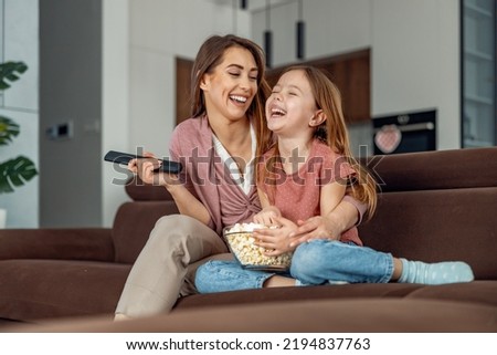 Similar – Image, Stock Photo Mother and Daughter watching sunset