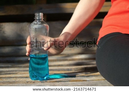 Similar – Image, Stock Photo Woman drinking isotonic drink while resting