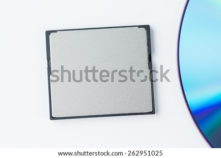 compact flash vs CD  isolated on white background