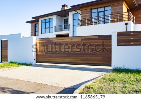 Similar – Image, Stock Photo old closed garden gate with wire mesh fence and hole