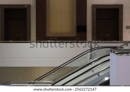 Similar – Foto Bild Rolltreppe am Eingang zu U-Bahn und S-Bahn bei Sonnenschein am Bahnhof Zoo in der Hauptstadt Berlin in Deutschland