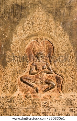 Relief Carving of a female Apsara dancer at Angkor Wat in Cambodia.