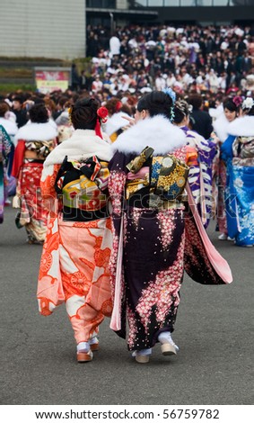 KAGOSHIMA CITY, JAPAN - JANUARY 10:  Women in kimono outside the culture center  during Coming of Age Day celebrations, January 10, 2010 in Kagoshima City, Japan.