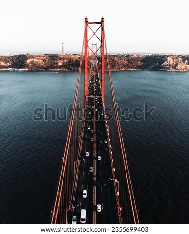 Similar – Foto Bild Ponte 25 de Abril Brücke in Lissabon während Sonnenuntergang mit Schiff und Jesus-Denkmal, bewölkten Himmel portugal