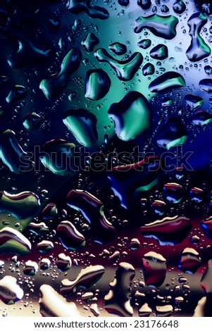 Multi-coloured drops of water