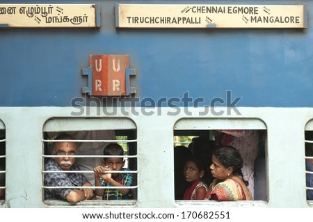 KERALA, INDIA - NOVEMBER 28: Unidentified passengers inside Indian Railway train on November 28, 2011 in Kerala, India. Indian Railways carries about 7,500 million passengers annually.