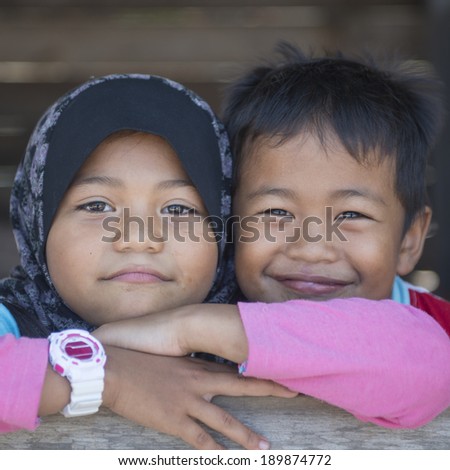 TERENGGANU, MALAYSIA - APRIL 9, 2014: Portrait of an unidentified Malay ethnic in Terengganu, Malaysia. The Malays, make up Malaysia\'s largest ethnic group, which is more than 50% of the population.