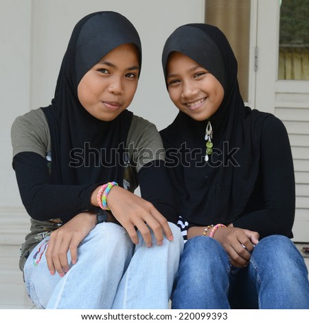 TERENGGANU, MALAYSIA - SEPTEMBER 20, 2014: Portrait of an unidentified Malay ethnic in Terengganu,Malaysia. The Malays,make up Malaysia\'s largest ethnic group, which is more than 50% of the population