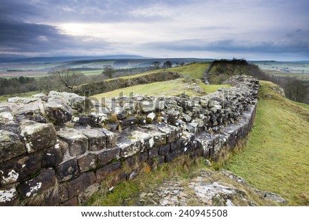 Hadrian's wall built by Roman's to protect northern borders of British Isle was extending from west coast to east coast of the Great Britain. Remainings of the wall near Walton Quarry, Northumberland