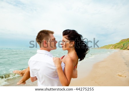 Romantic couple enjoying their time together at the beach