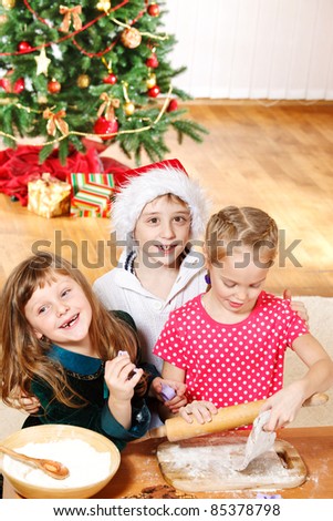 Little friends making Christmas cookies