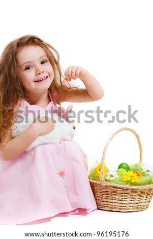 Adorable girl holding white bunny, over white