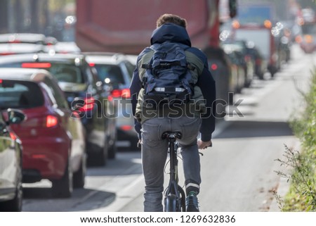 Similar – Image, Stock Photo cyclist on the traffic light
