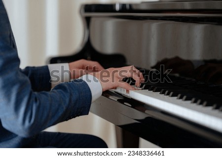 Similar – Image, Stock Photo Boy playing piano at home