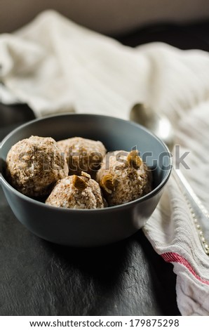 Energy balls in bowl on table