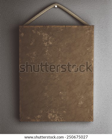 mockup of blank brown leather canvas on the wall