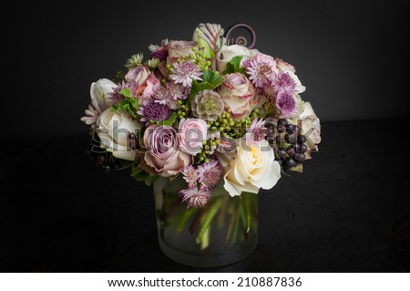 Flower arrangement bouquet on black background