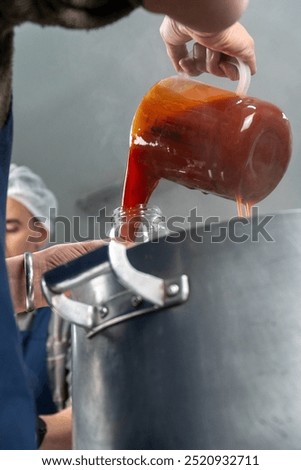 Similar – Image, Stock Photo Homemade jam being poured in a jar