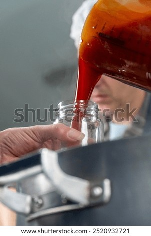 Similar – Image, Stock Photo Homemade jam being poured in a jar