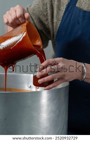 Similar – Image, Stock Photo Homemade jam being poured in a jar