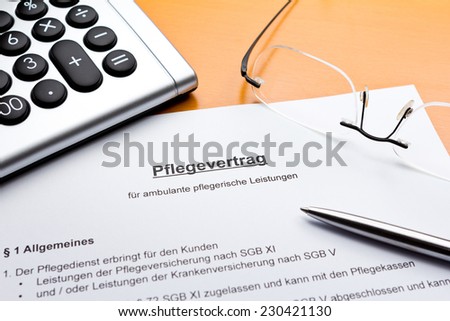 Contract about a nursing service on an outpatient basis with calculator, reading glasses and ballpoint pen, pflegevertrag