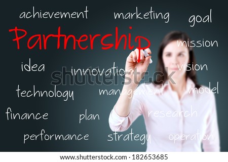 Young business woman writing partnership concept.
