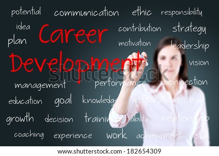 Young business woman writing career development concept.