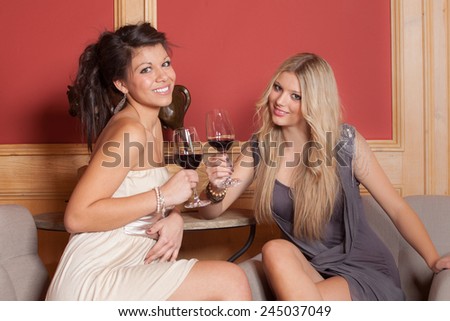 cheers clink glasses - woman and red wine