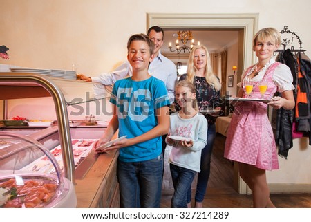family breakfast in a hotel - breakfast buffet
