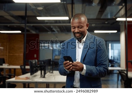 Similar – Image, Stock Photo Cheerful black man using smartphone in cafe