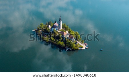 Image, Stock Photo Aerial view of Bled island on lake Bled, and Bled castle and mountains in background, Slovenia.