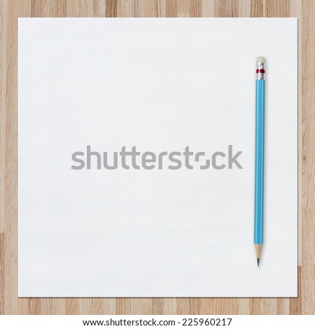 White paper texture background for painting, drawing and sketching and blue pencil on wood background.
