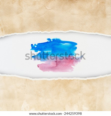 Ripped vintage paper texture with abstract colorful watercolor brushed background.