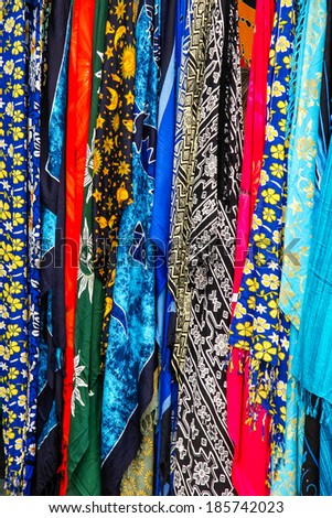 LANZAROTE, CANARY ISLANDS/SPAIN - JULY 31 : Multicoloured silk scarves on a market stall in Lanzarote on July 31, 2005