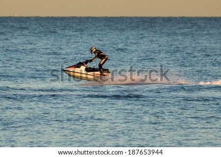 DUNGENESS, KENT/UK - DECEMBER 17 ; Man riding a jet ski off Dungeness beach in Kent on December 17, 2008. Unidentified man.