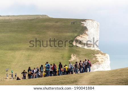 BEACHY HEAD, SUSSEX/UK - MAY 11 : School trip pausing before the ascent on the South Downs at Beachy Head in Sussex on May 11, 2011. Unidentified people.