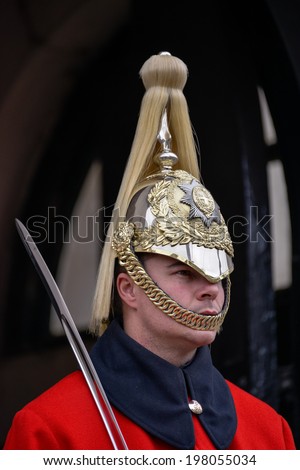 LONDON - MARCH 6 : Lifeguard of the Queens Household Cavalry on duty in London on March 6, 2013. Unidentified man.