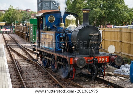 EAST GRINSTEAD, WEST SUSSEX/UK - SEPTEMBER 8 : Bluebell steam engine in East Grinstead on September 8, 2013. Unidentified people.