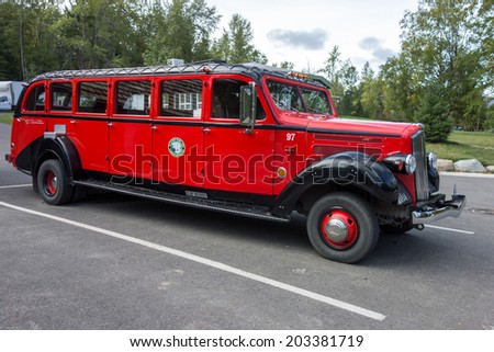 LAKE MCDONALD LODGE, GLACIER NATIONAL PARK/USA - SEPTEMBER 21 - Red Bus in Glacier National Park Montana on September 21, 2013
