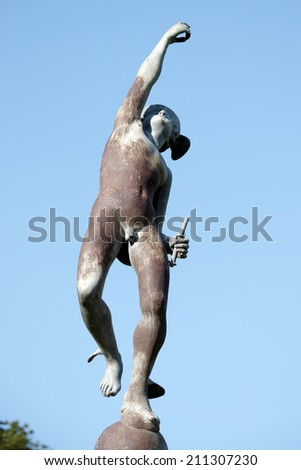 PORT LYMPNE, KENT/UK -AUGUST 13 : Statue of Hermes in Port Lympne Mansion Gardens in Kent UK on August 13, 2014