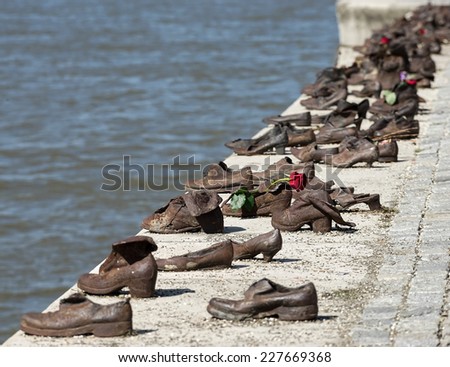 BUDAPEST, HUNGARY/EUROPE - SEPTEMBER 21 : Iron shoes memorial to Jewish people executed WW2 in Budapest Hungary on September 21, 2014