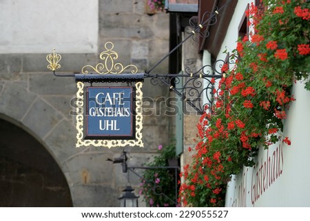 ROTHENBURG, GERMANY/EUROPE - SEPTEMBER 26 : Cafe Gatehaus UHL hanging sign in Rothenburg Germany on September 26, 2014