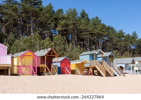 WELLS NEXT THE SEA, NORFOLK/UK - JUNE 3 : Some brightly coloured beach huts in Wells Next the Sea Norfolk on June 3, 2010