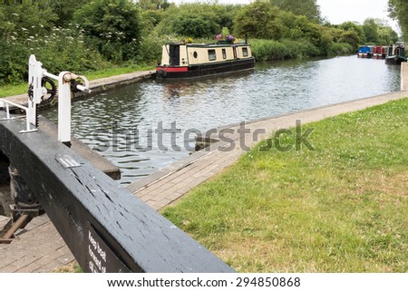ALDERMASTON, BERKSHIRE UK - JULY 5 : Narrow boats on the Kennet and Avon Canal in Aldermaston Berkshire on July 5, 2015