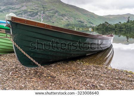 ULLSWATER, LAKE DISTRICT/ENGLAND - AUGUST 22 : Rowing Boats Moored on Ullswater in the Lake District England on August 22, 2015