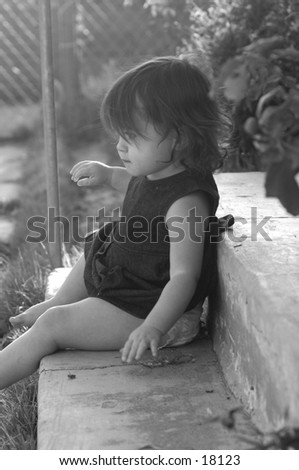 baby sitting on porch