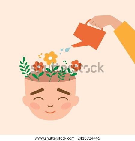 Mental health concept. human hand watering head with flowers. Self-care. Positive thinking